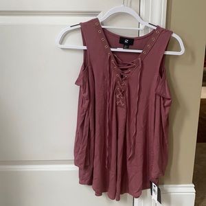 IZ Byer mauve long sleeve shirt with cut out for shoulders. Never worn before.